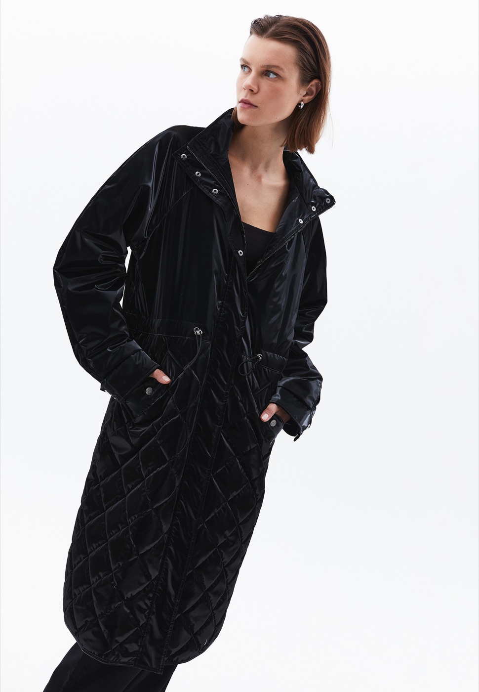 Black technical raincoat